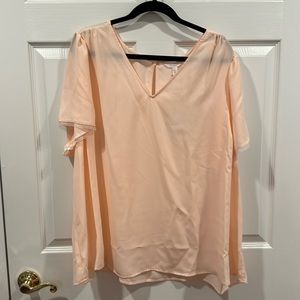 Brand new peach shirt.